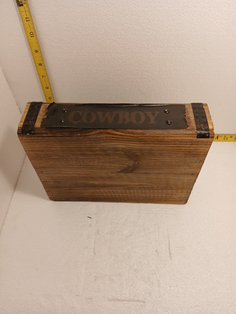 small wooden box with hinged lid