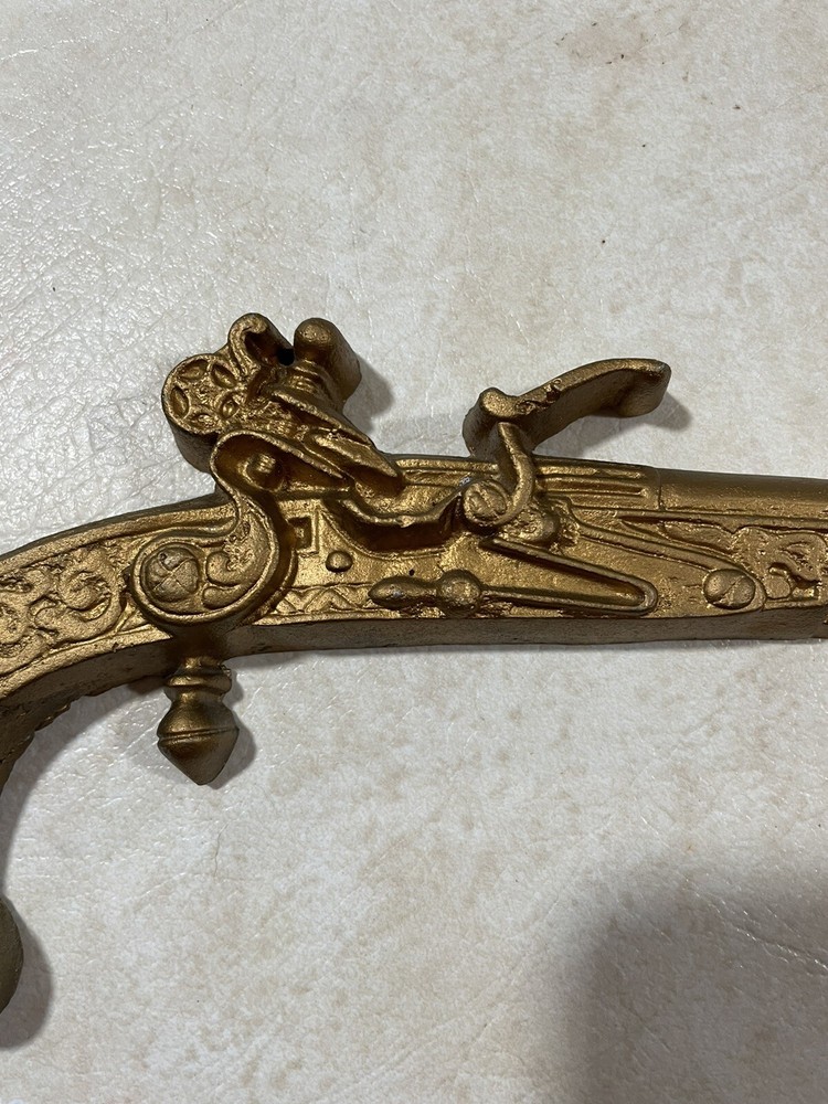 handmade wall hanging gun