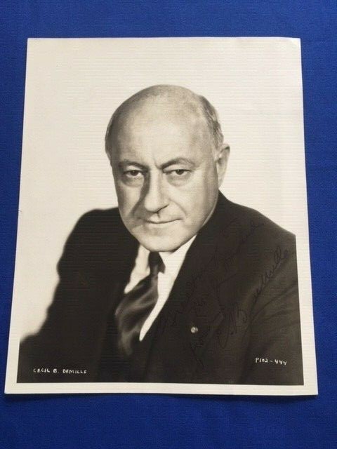 PUBLICITY PHOTOGRAPH INSCRIBED BY CECIL B. DEMILLE