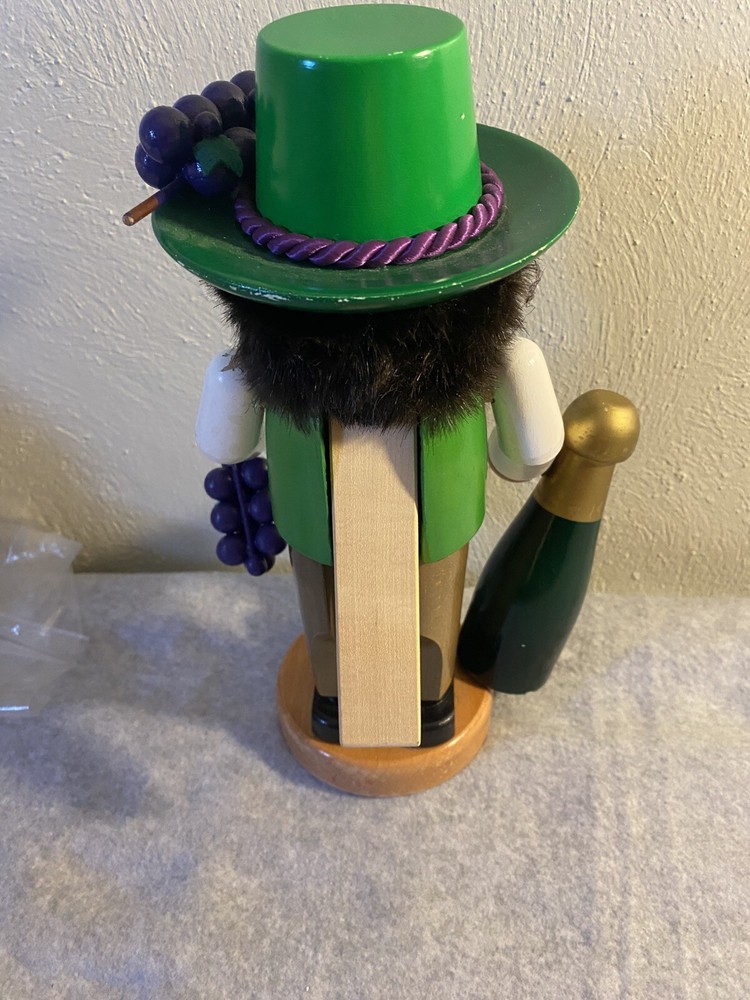 steinbach nutcracker signed Holding Wine Bottle And Grapes