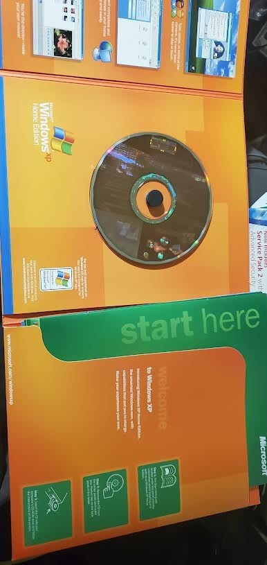 Microsoft Windows XP home Edition 2002 ~ CD