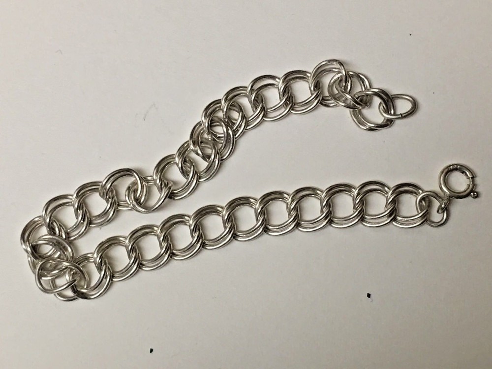 CHARM  STERLING BRACLET  7 INCHES