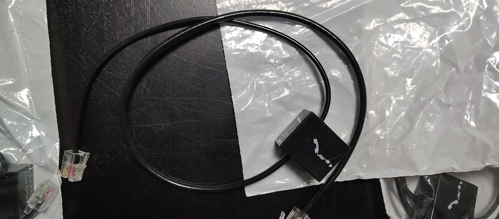 Plantronics phone headset interface cable, new in original bag, model 86007-01