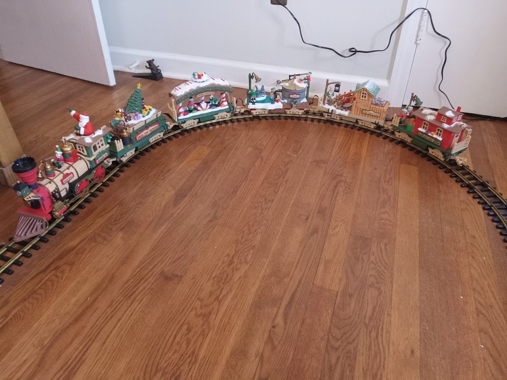 The Holiday Express Animated Train Set. Complete working set plus 2 extra cars.