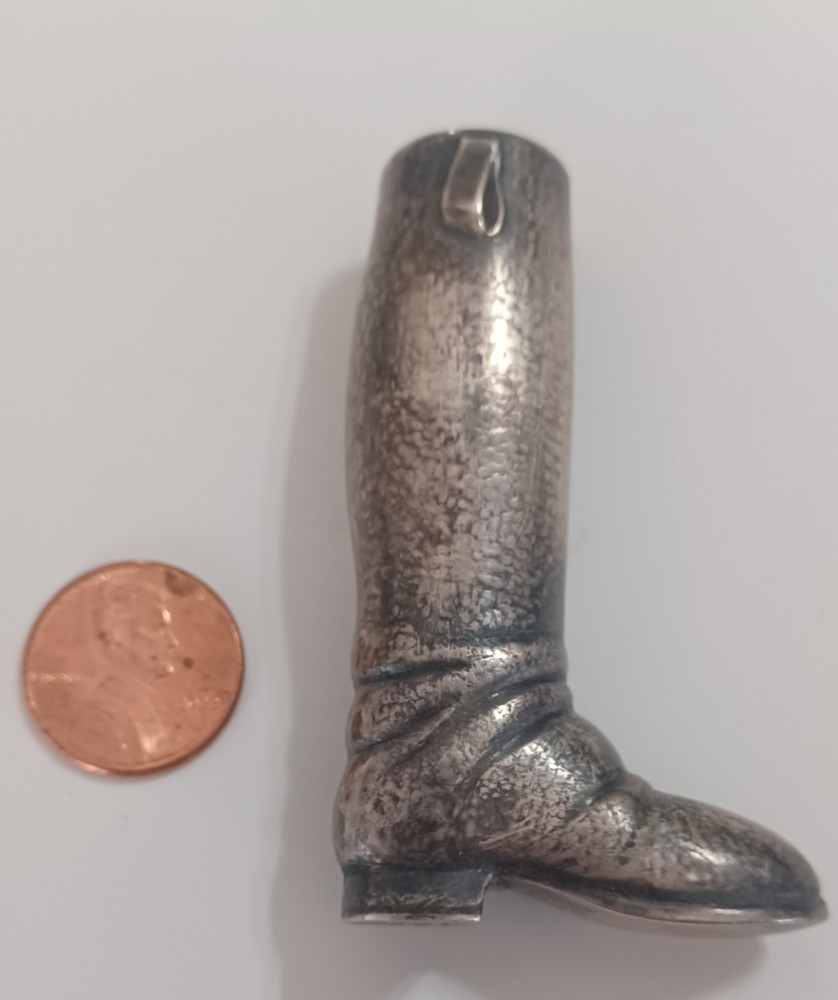 Sterling. 925 boot shaped handle.