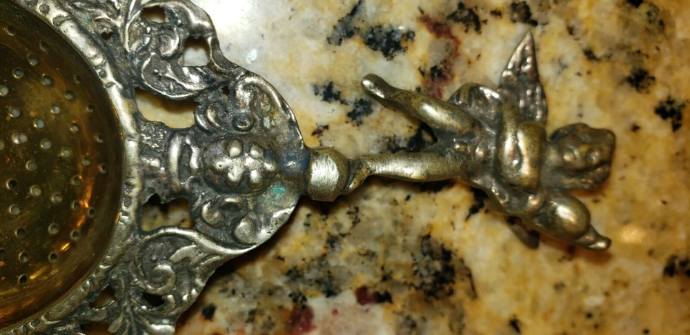 Ornate Antique Tea Strainer - Etched - Unknown Origin - see pics Cherub handle