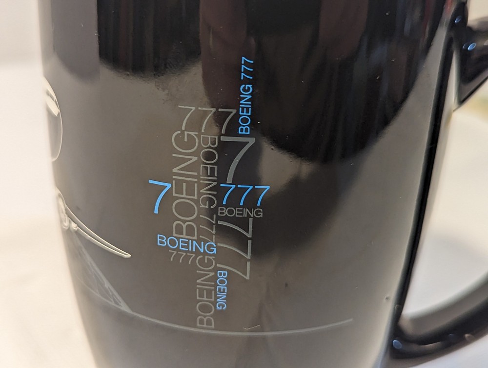 Boeing 777 Airliner Coffee Mug.