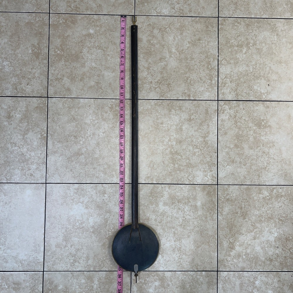 Junghans vintage grandfather clock pendulum.