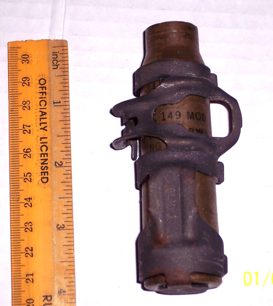 Rare 20mm brass shell casing with clip