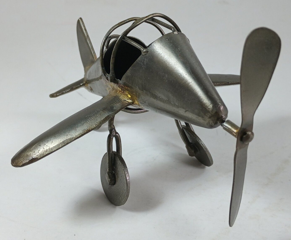 Whimsicle Metal Art Airplane.
