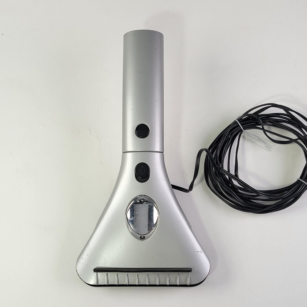 Heated Ice Scraper Has A Light And A 14.5 Foot Cord. Never Used