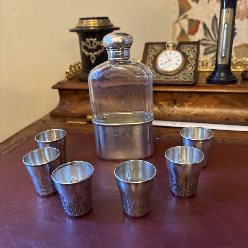 Solid silver hip flask c1900 & Six Antique Continental Solid Silver Shot Cups