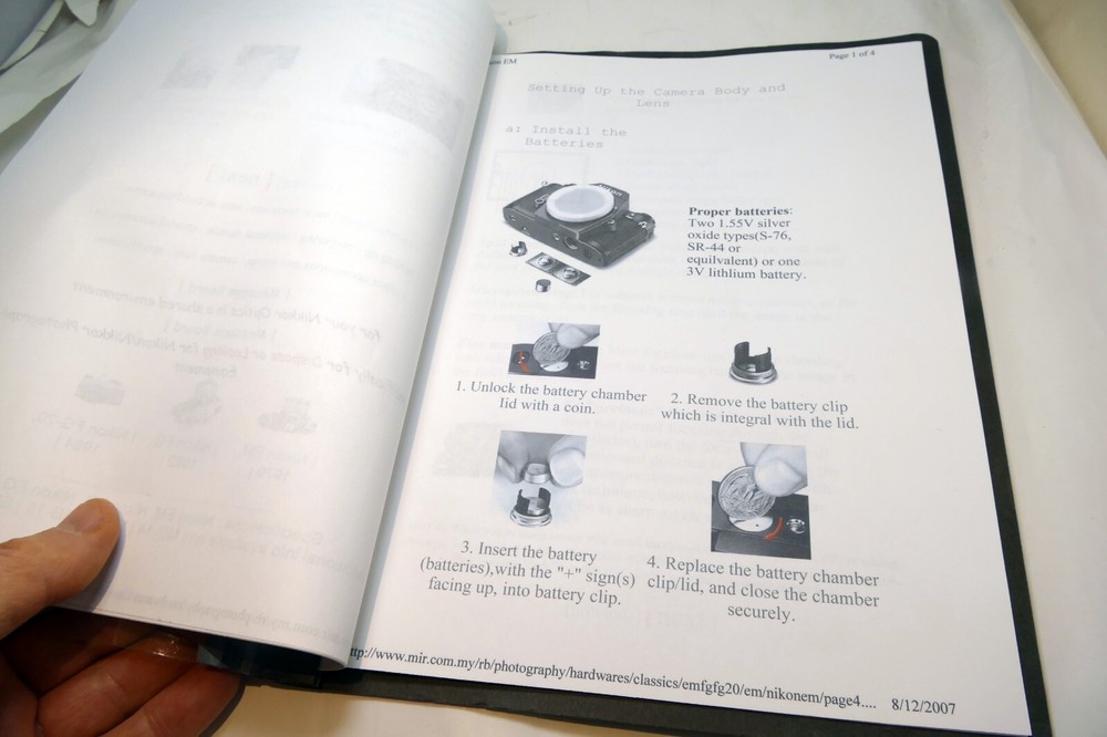 Camera guide instruction manual printed and bound folder for Nikon EM
