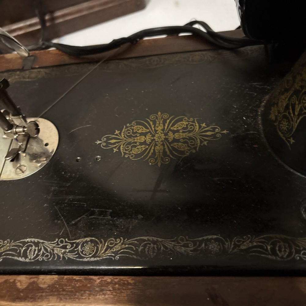 SINGER EG054349 PORTABLE SEWING MACHINE