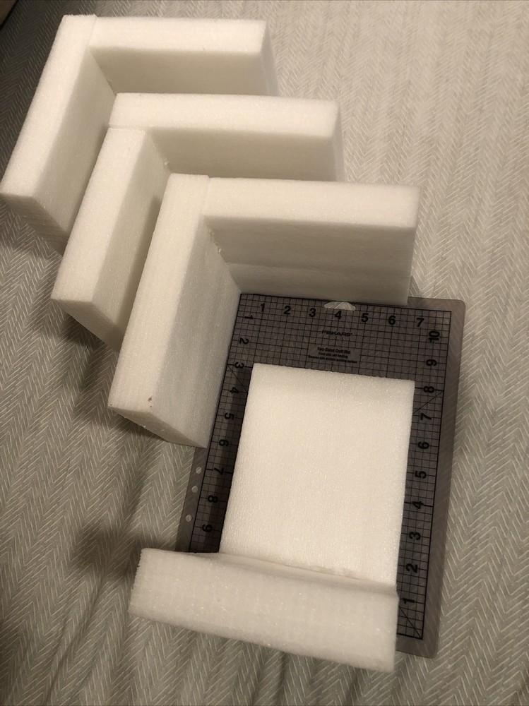 4 Corner Guards, Flexible Styrene packing material about 8x5.5” sides 1.5” thick