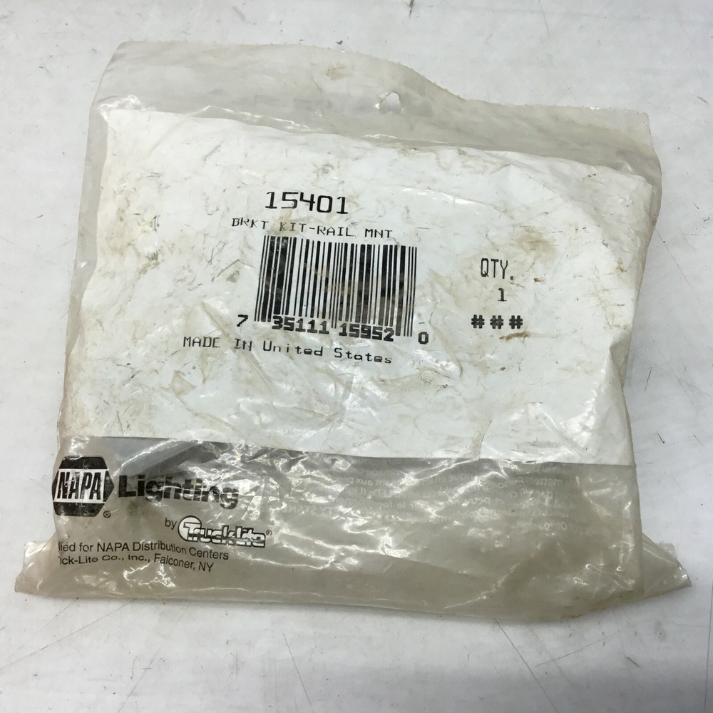 NEW SEALED NAPA LIGHT BRACKET 15401