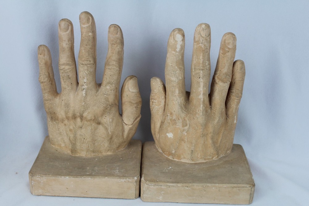 Plaster bookends Reading Hands