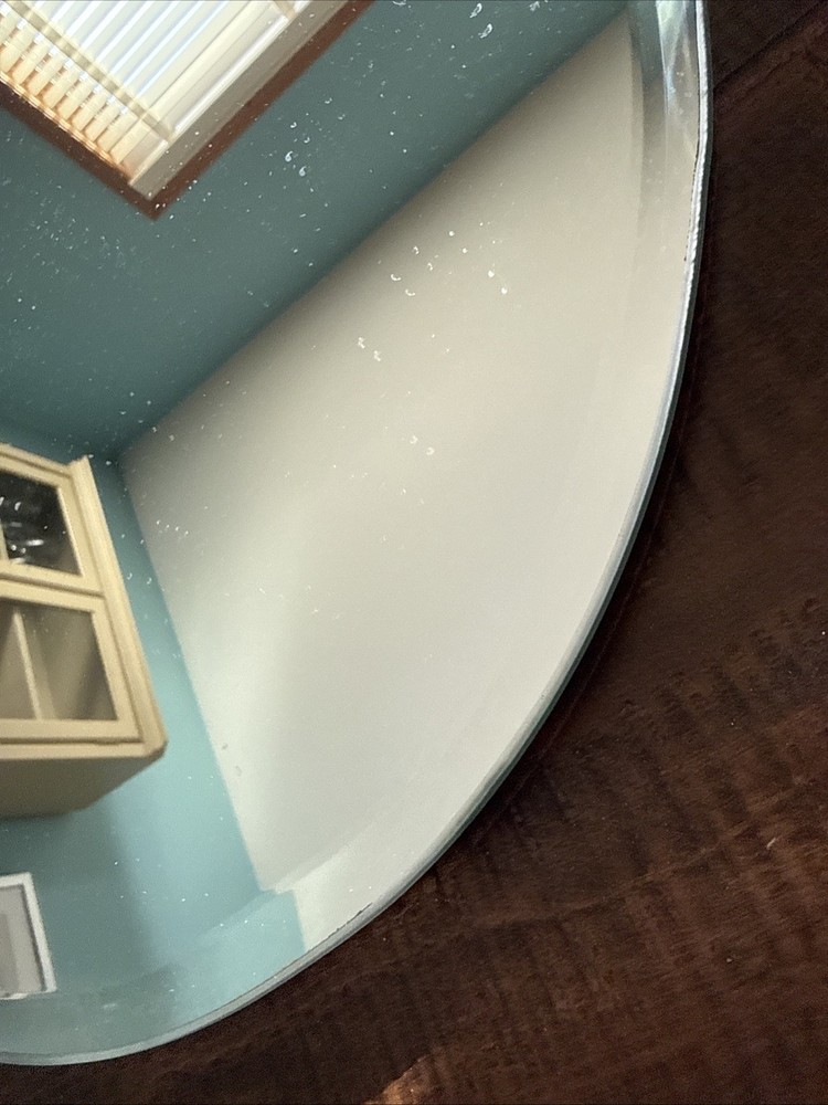 Frameless Oval Shaped Beveled Mirror 31.5" X 19.5"