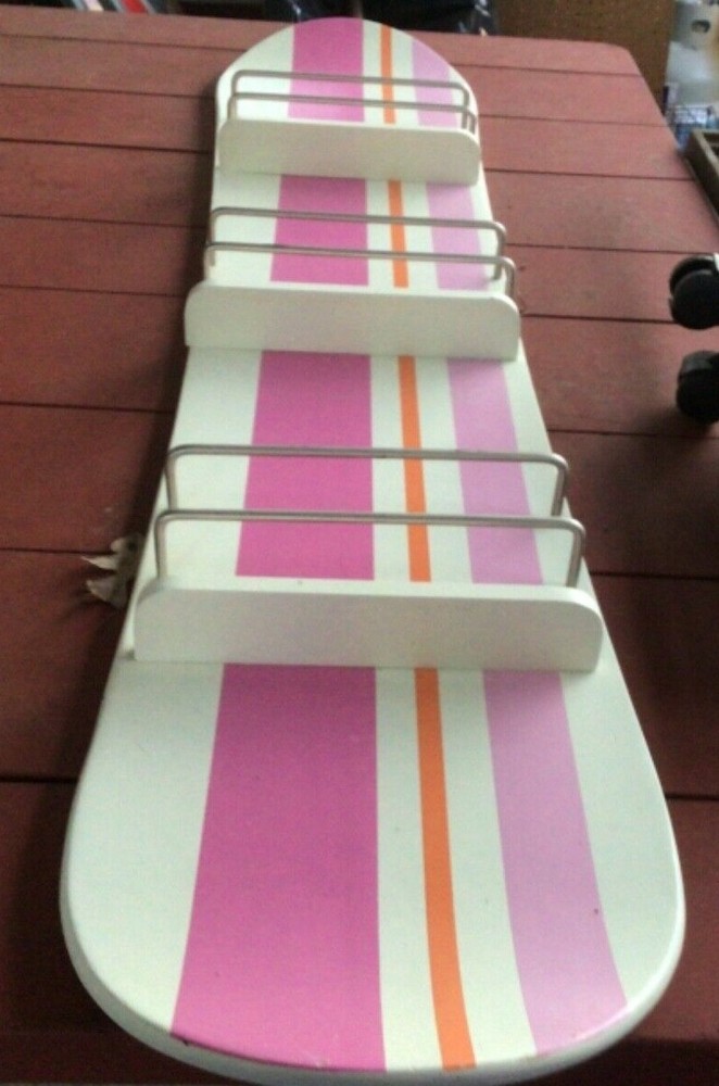 COMIC BOOK OR MAGAZINE RACK SNOWBOARD DESIGN
