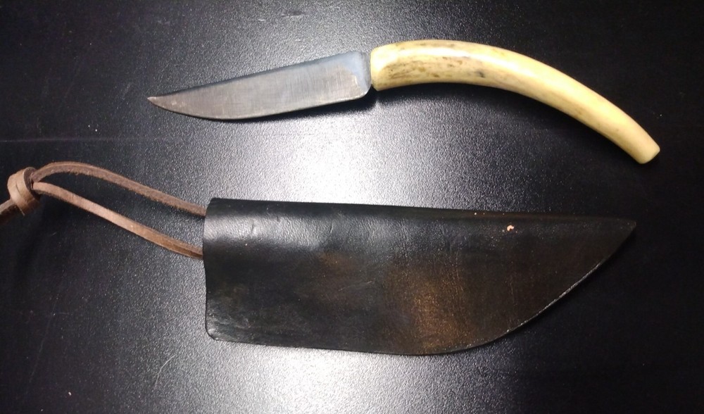 Unique handmade 8" knife in leather sheath