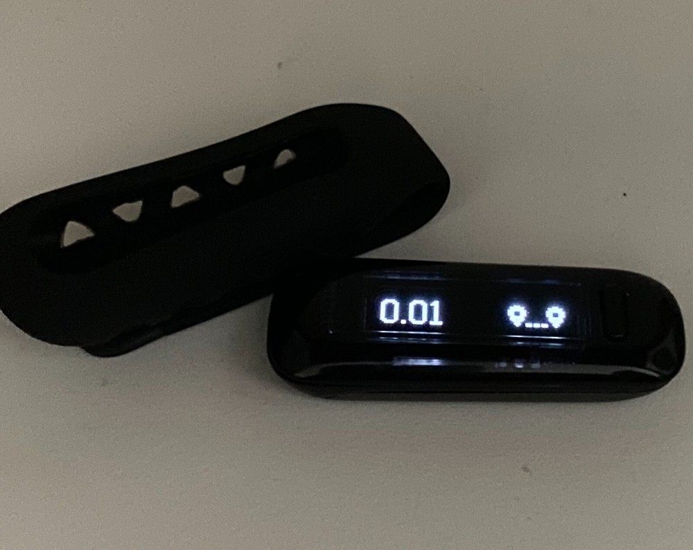 Fitbit One Black & Holder -version 6.46 new battery.PLEASE READ THE DESCRIPTION!