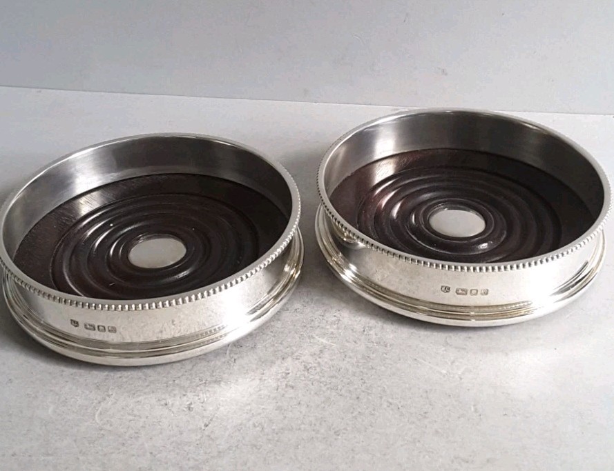 GOOD , PAIR VINTAGE SOLID SILVER COASTERS . 12 . 5 cms. dia. LON. 1973