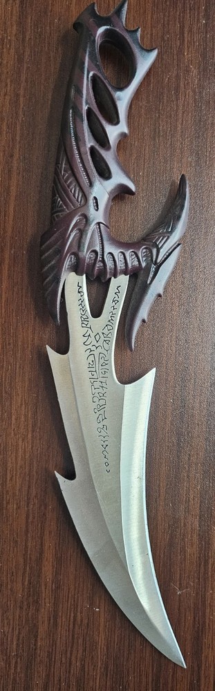 Fantasy Dragon Claw Dagger with Intricate Handle Design