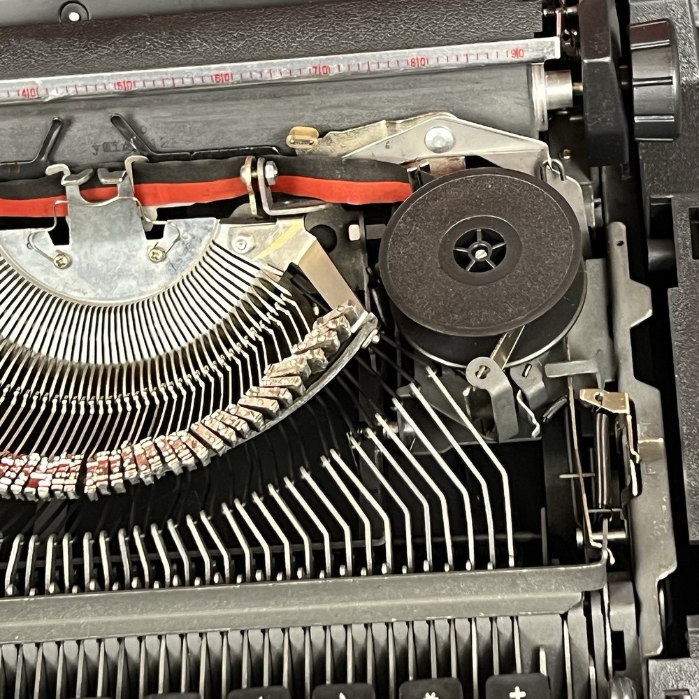 Generation 3000 Manual Typewriter with Case and Paperwork