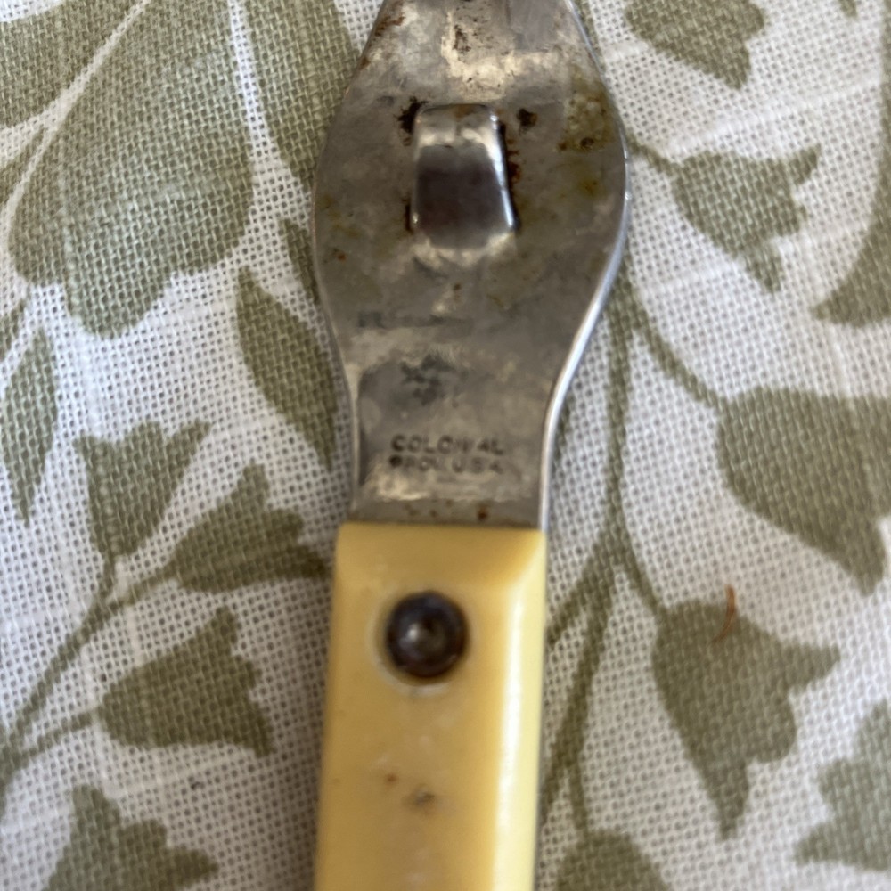 Vintage Bottle Opener USA Bakelite Handle?