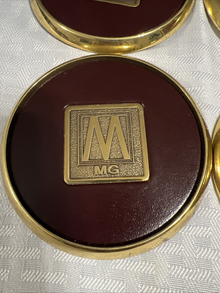 8 Vintage Solid BRASS and Brown LEATHER M MG COASTERS