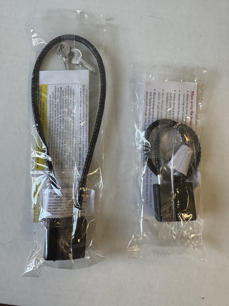 TWO GUN CABLE LOCKS WITH TWO KEYS FOR EACH