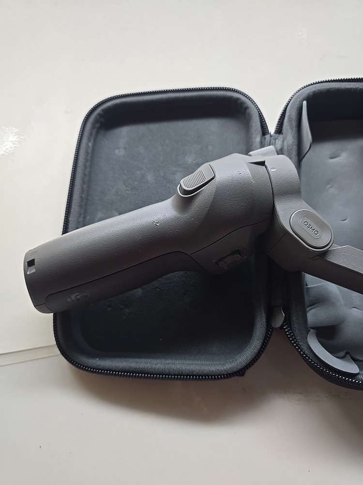 DJI Osmo Handheld 4k Camera and 3-Axis Gimbal