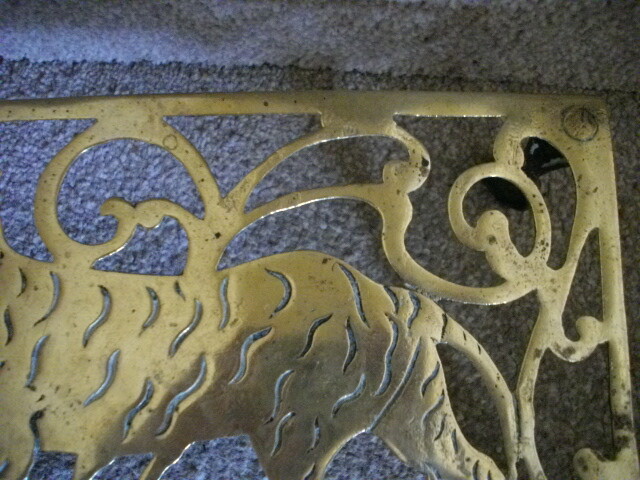 Brass trivet stand with strolling Tiger c1880
