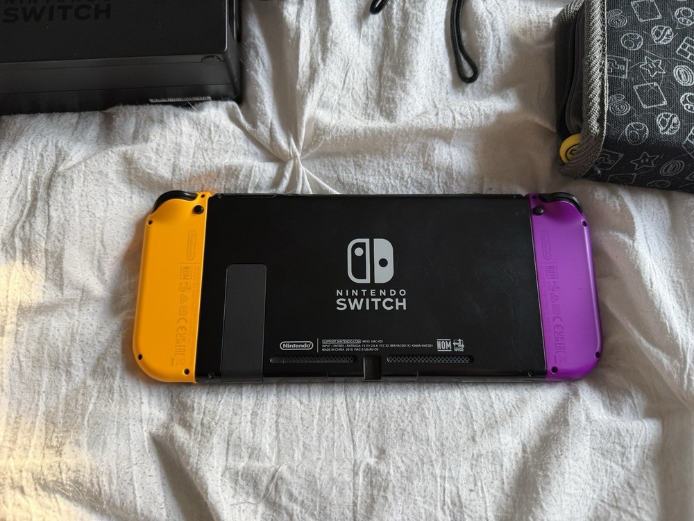 Nintendo Switch Bundle with Extra Joy-Con, Case, Dock, Cables, & Straps