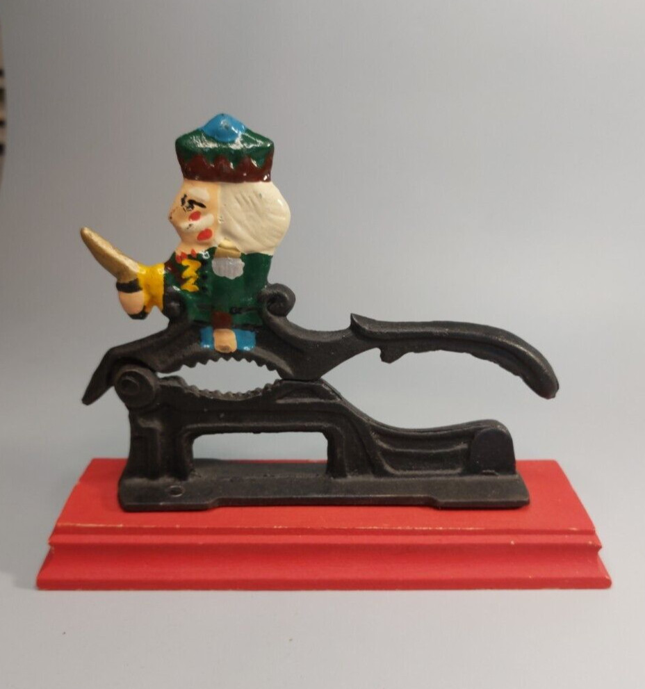 Cast Iron Painted Soldier Nut Cracker on wood base