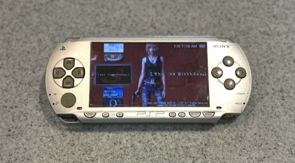 Sony PSP-1000 Silver Handheld Console with Charger- 1000+ Game Library