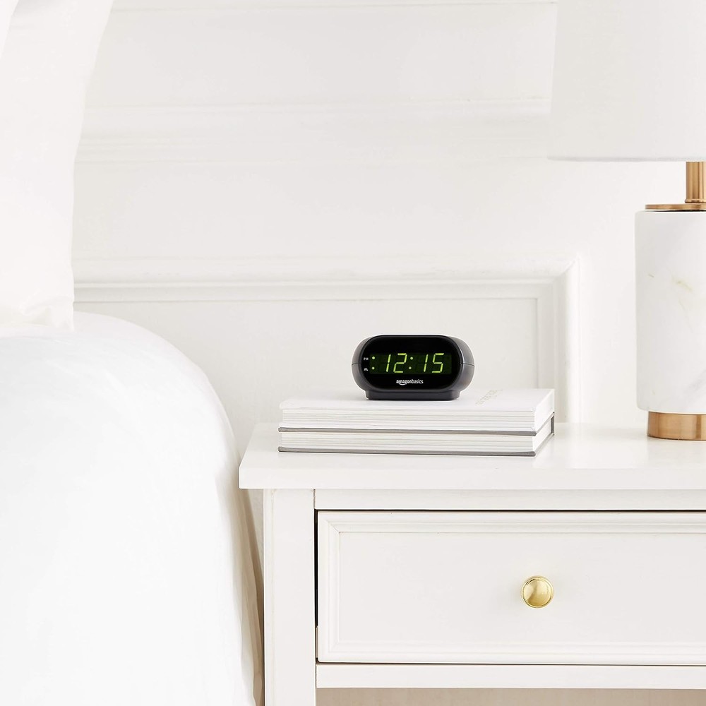 Compact Oval Black Digital Alarm Clock with LED Display & Snooze Functionality