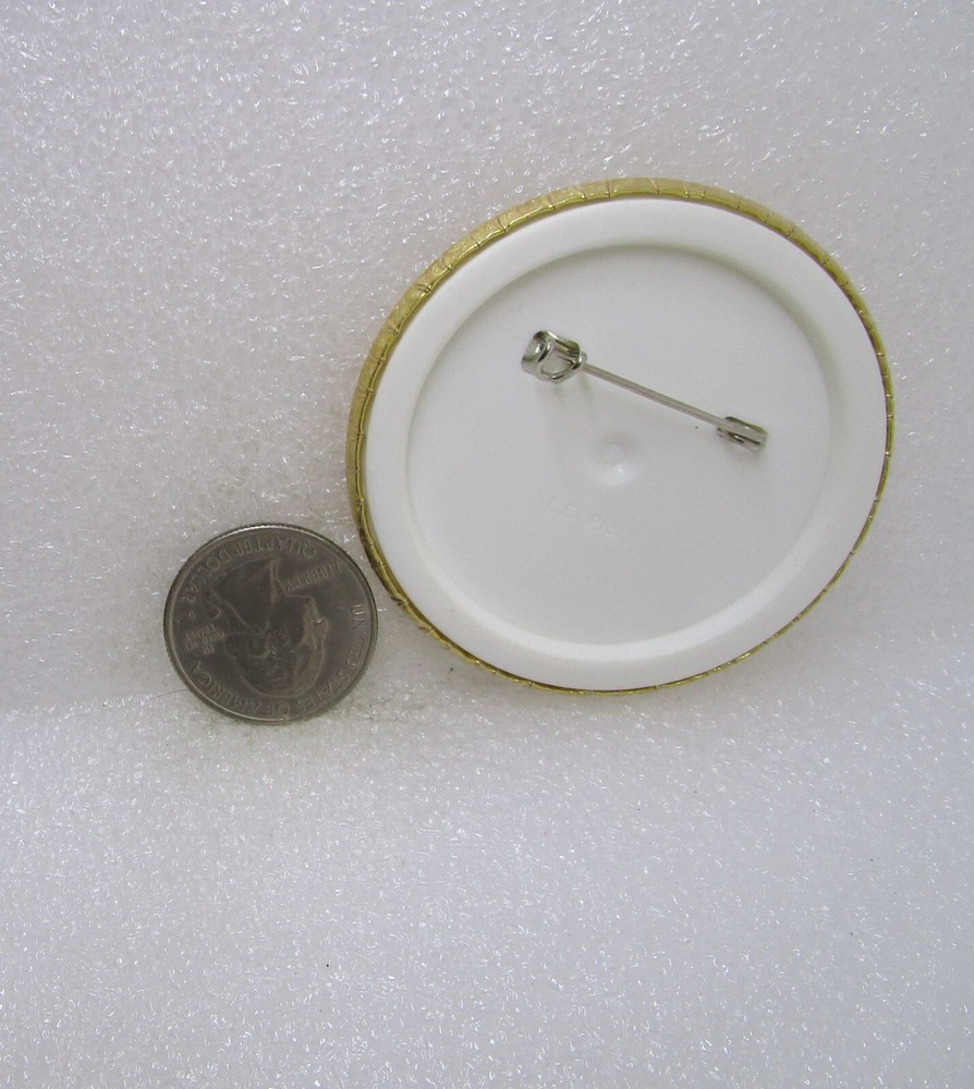 Madame Tussaud's Button Pin