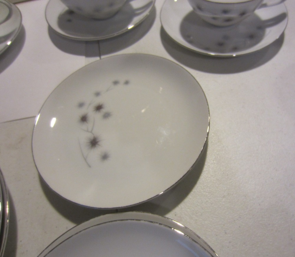 Vintage Creative Platinum Starburst China Dinnerware place settings for 4
