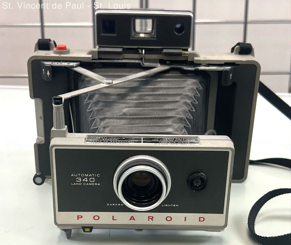 Vintage Polaroid Automatic 340 Land Camera Silver Folding -Pre-Owned -Not Tested