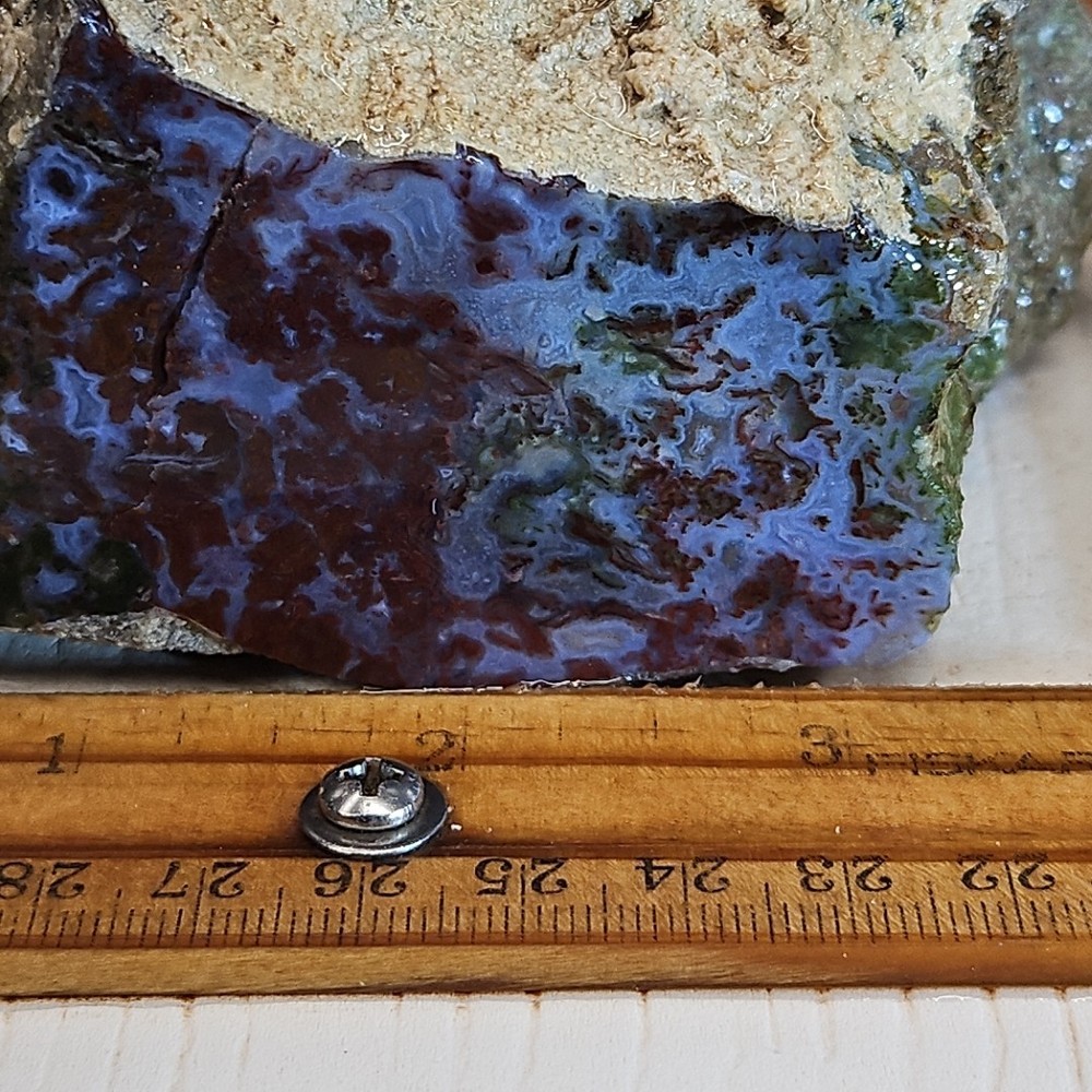 Red lightning agate rough. Beautiful blue color and moss pattern, 2LBs 2.0oz