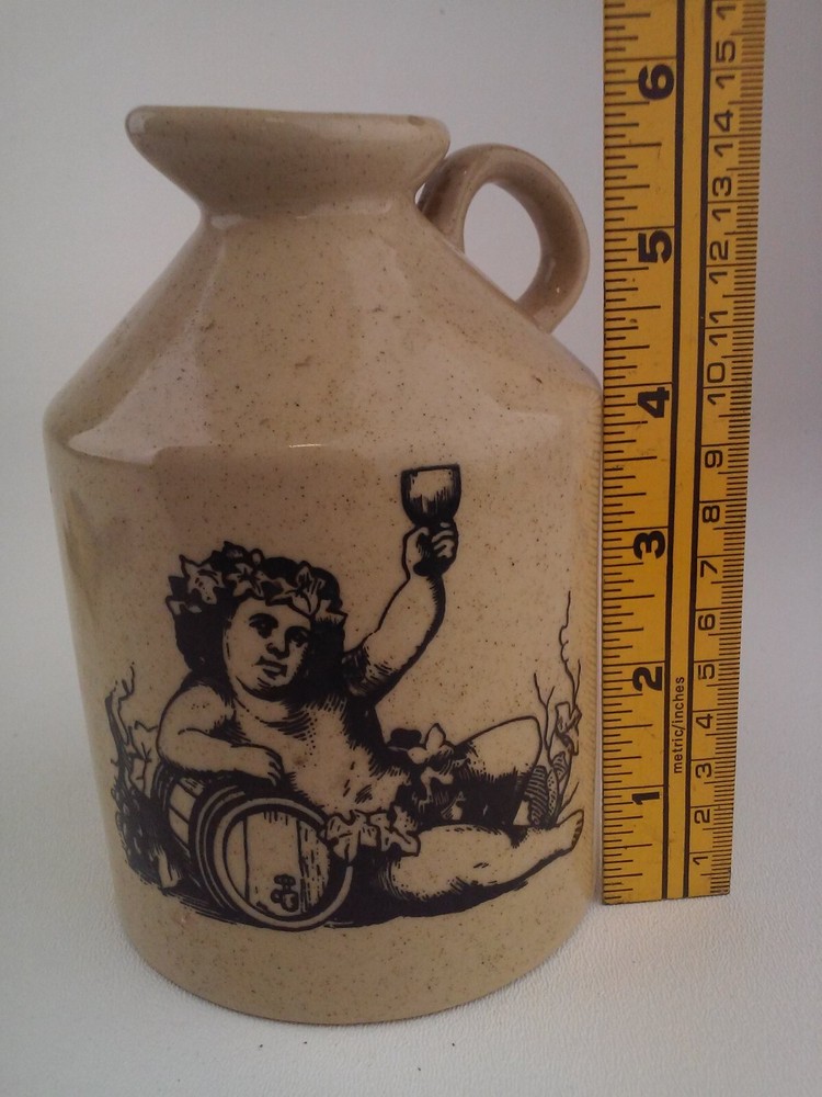 Salt Glazed Jug with Cherub Drinking Wine