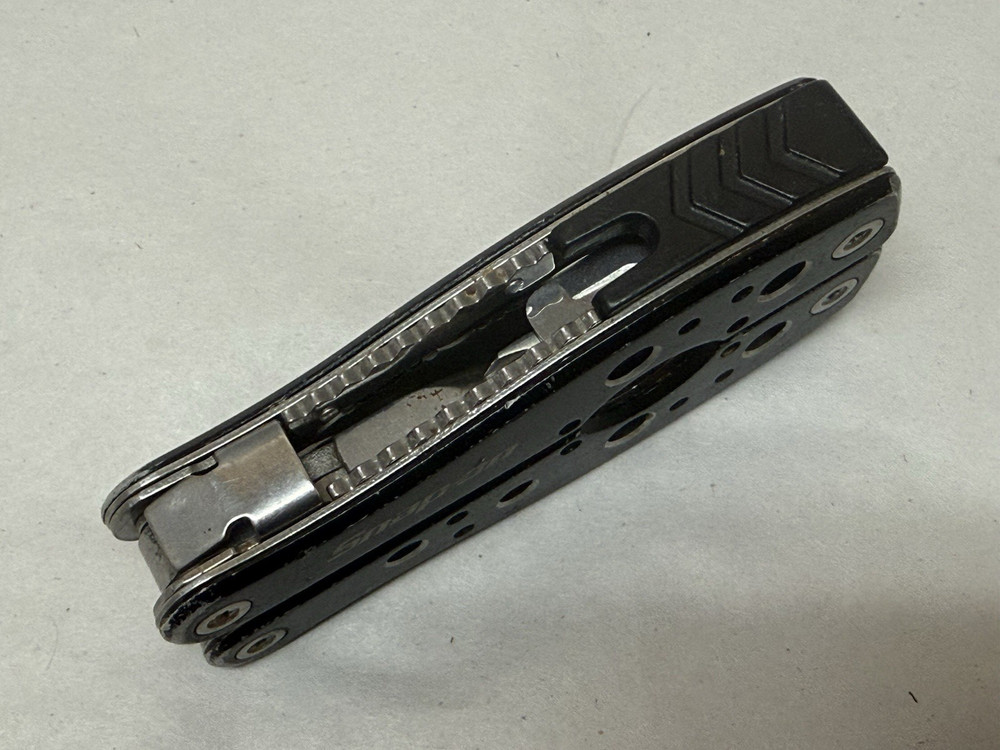 Snap-On Multi-Tool Knife Screwdriver File Saw Pliers