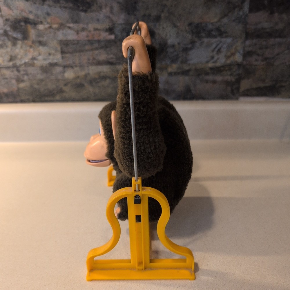Antique Collectable Swinging Monkey ( Battery compartment needs cleaning)
