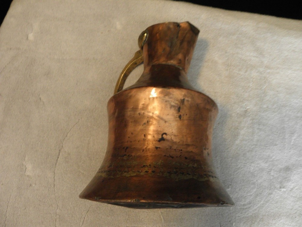 Vintage or antique copper jug