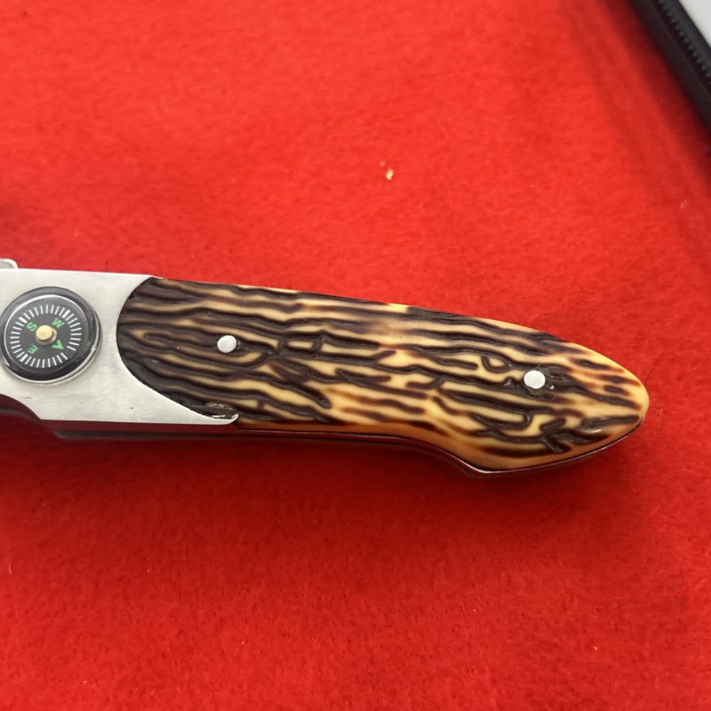Vintage Power Star Folding Lockback Knife with Compass on handle