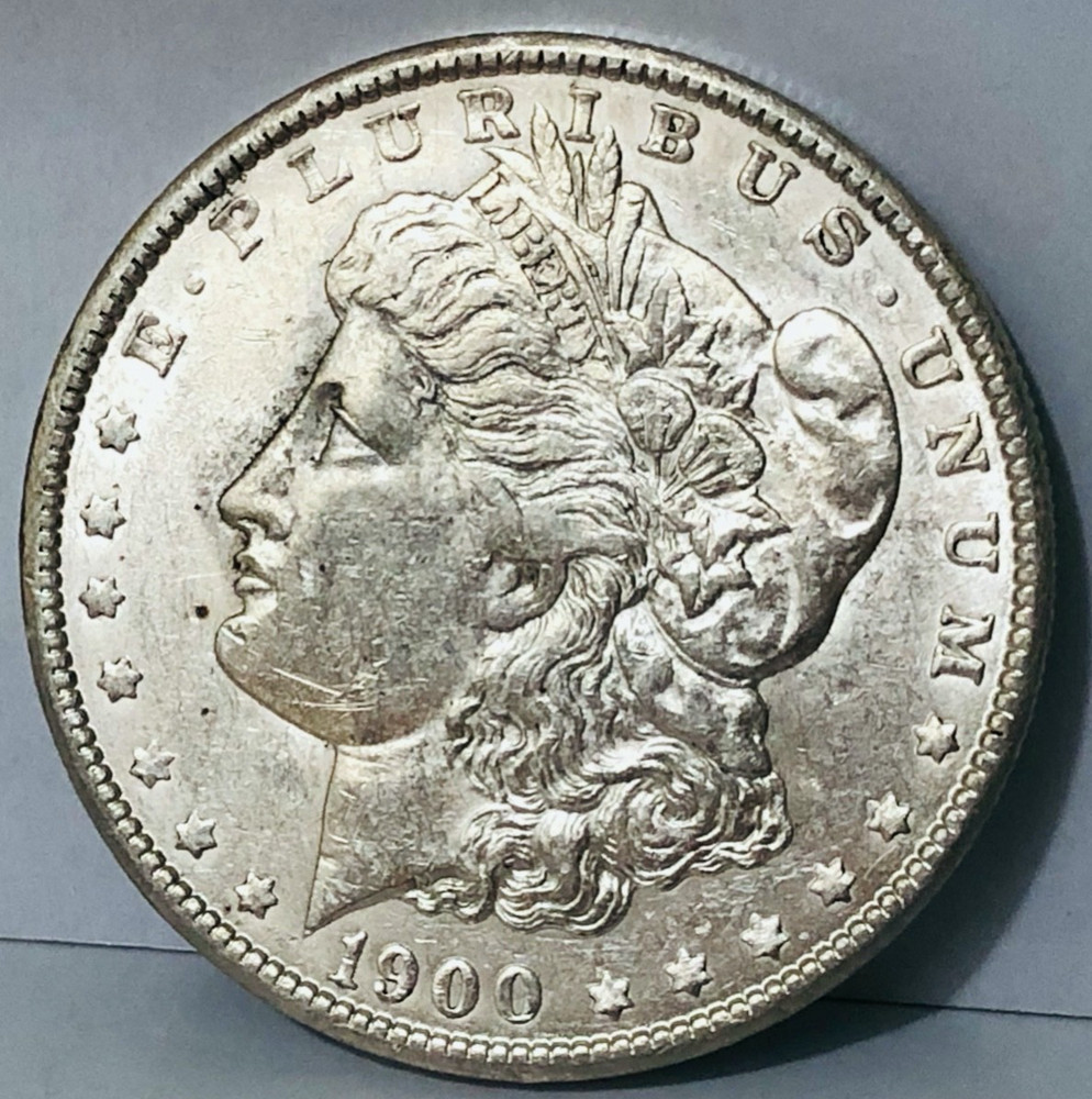 1900 MORGAN SILVER DOLLAR.