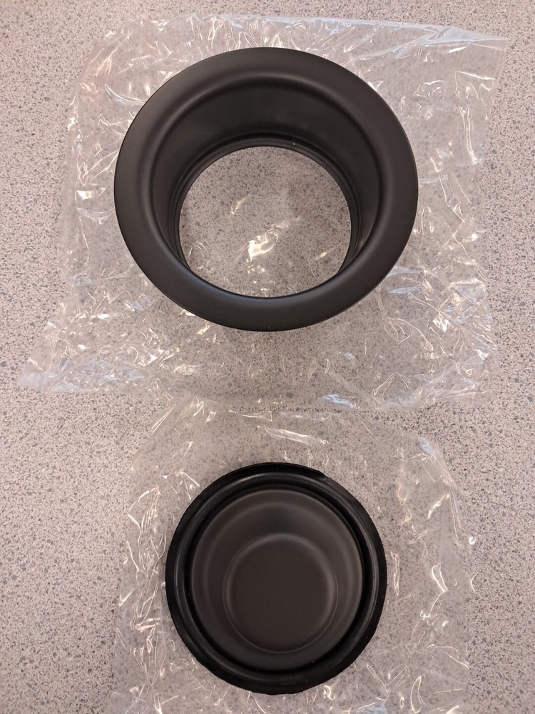 Waste Disposer Trim Collar With Matching Stopper In Oil Rubbed Bronze Finish