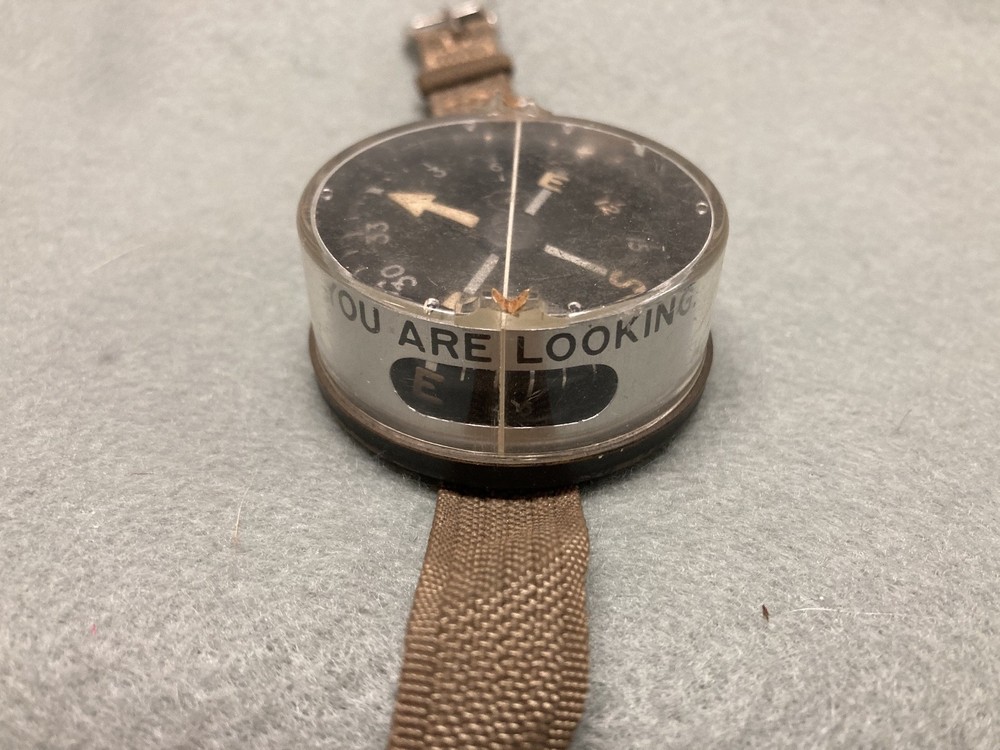 (a105) vintage Compass on wrist strap