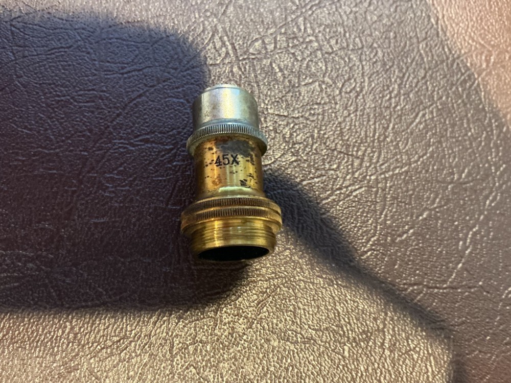 ERNST LEITZ MICROSCOPE WITH 3 OBJECTIVES AND CASE.